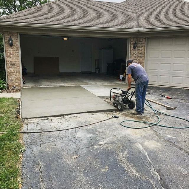 uneven driveway repair cost Delaware - settlement at garage approach